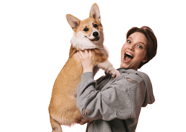 Happy person holding a dog